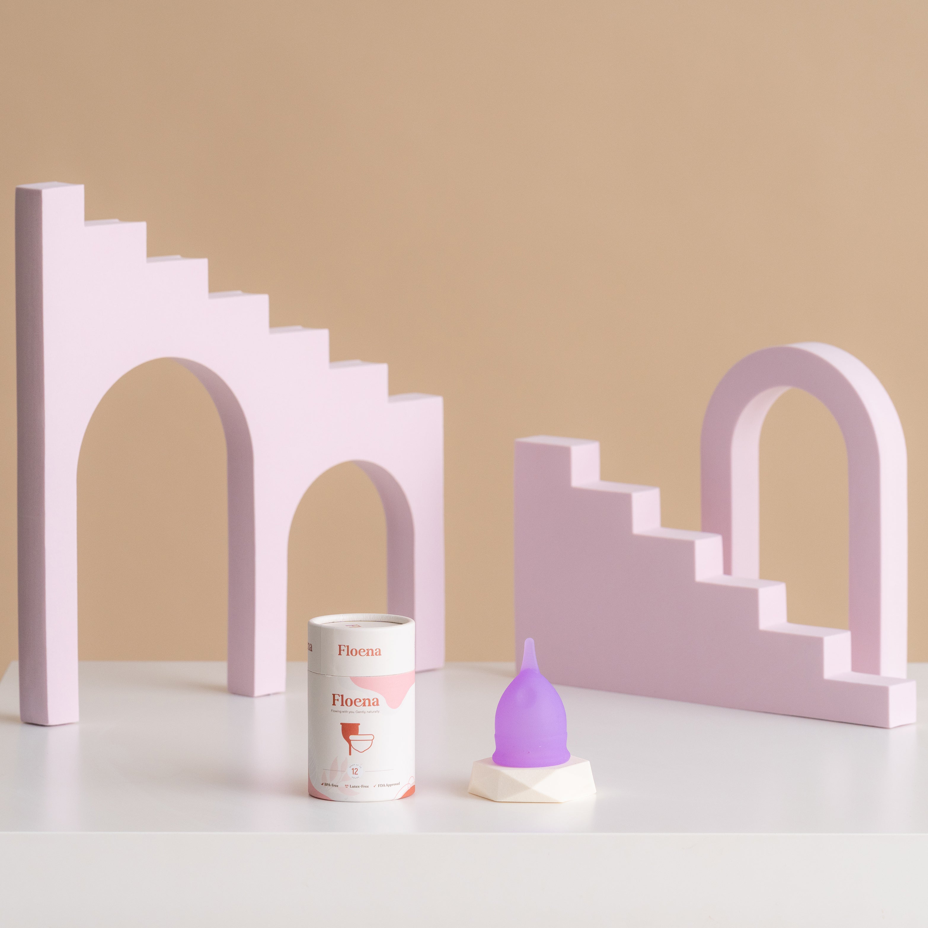 Floena Flexi Menstrual Cup in purple, with eco-friendly packaging. Designed for secure, leakproof protection for up to 12 hours, made from soft, flexible medical-grade silicone.