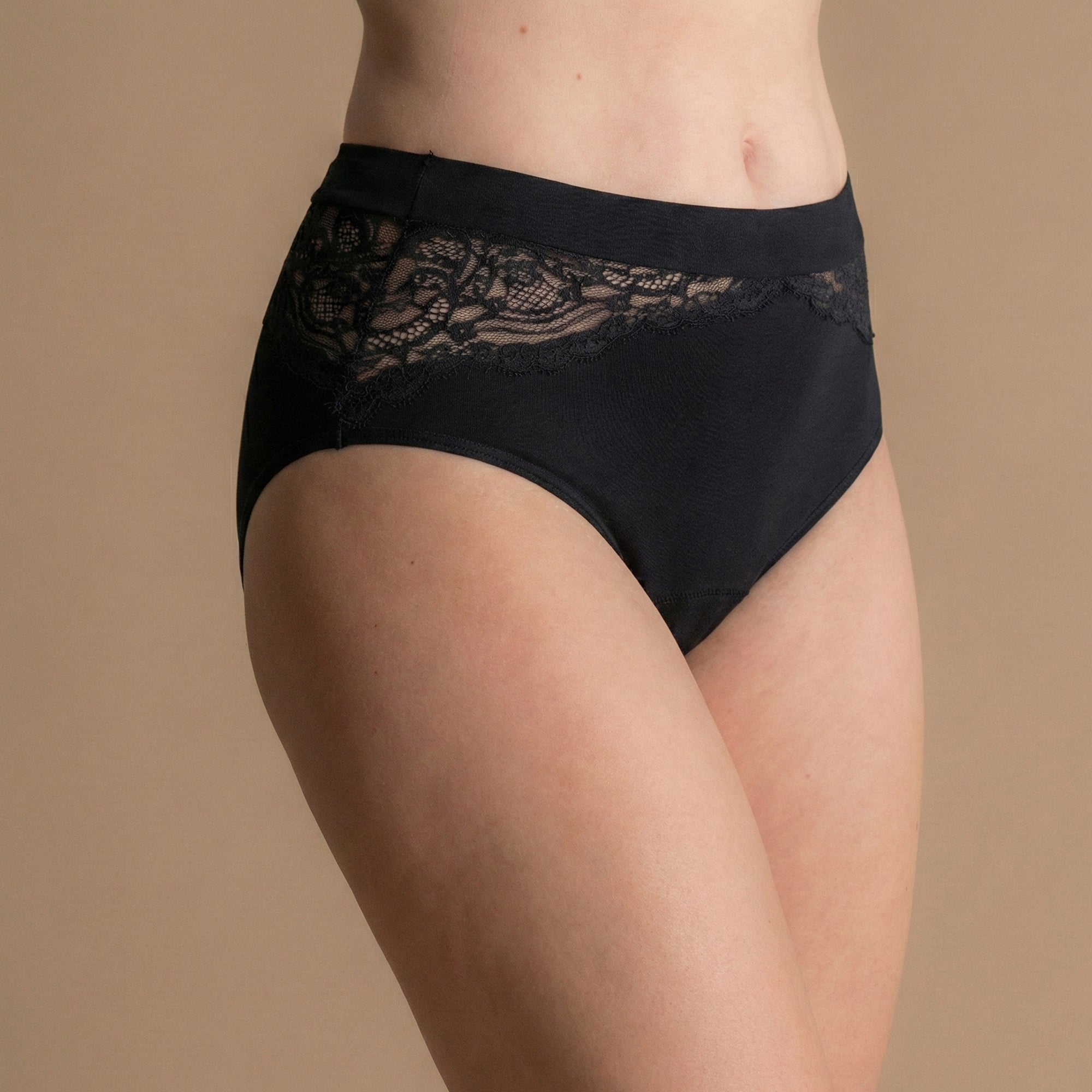 Woman wearing black leakproof bamboo lace brief close-up view