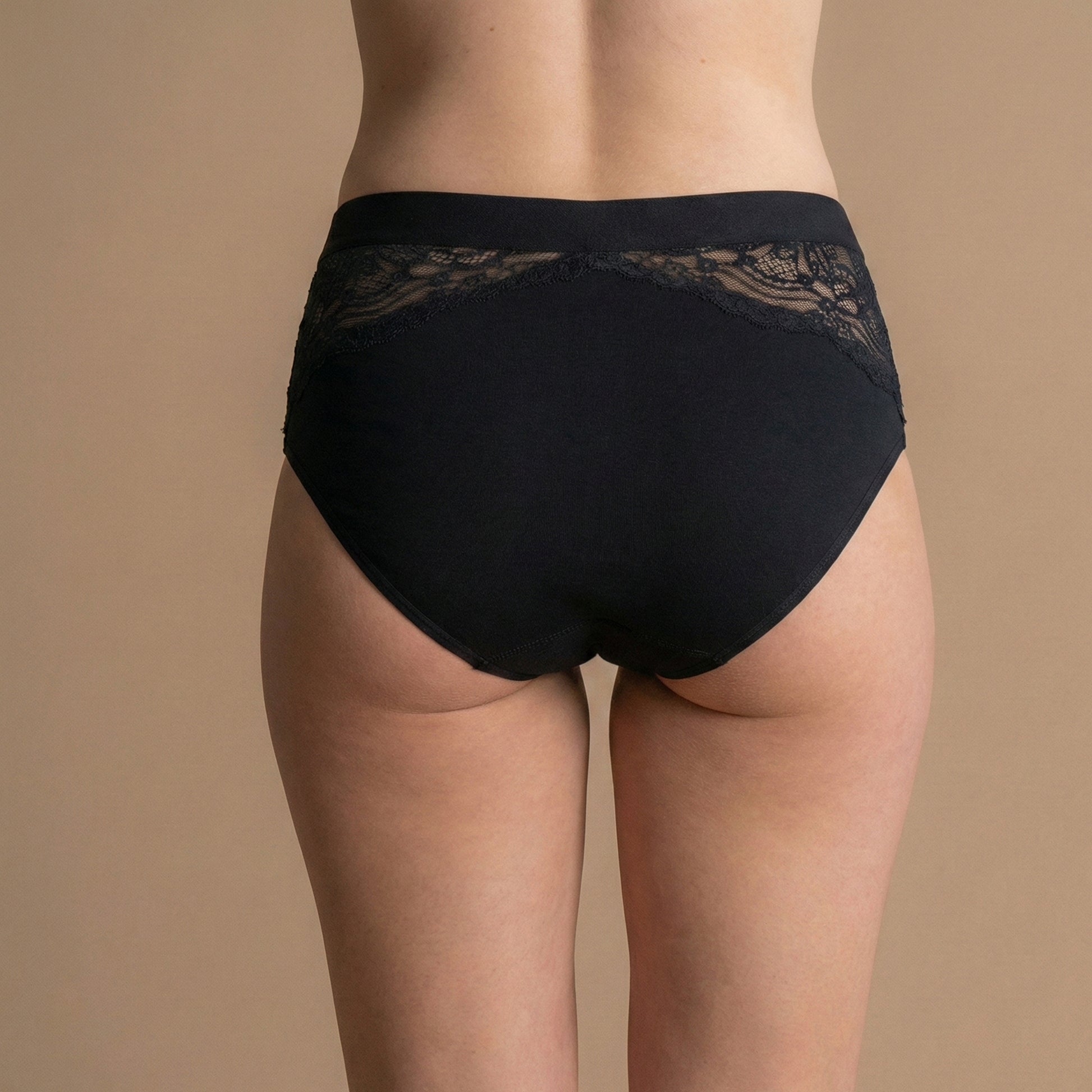 Leckgeschützte Bambus-Spitzenunterhose in Schwarz – hinterer Spitzen-Detail