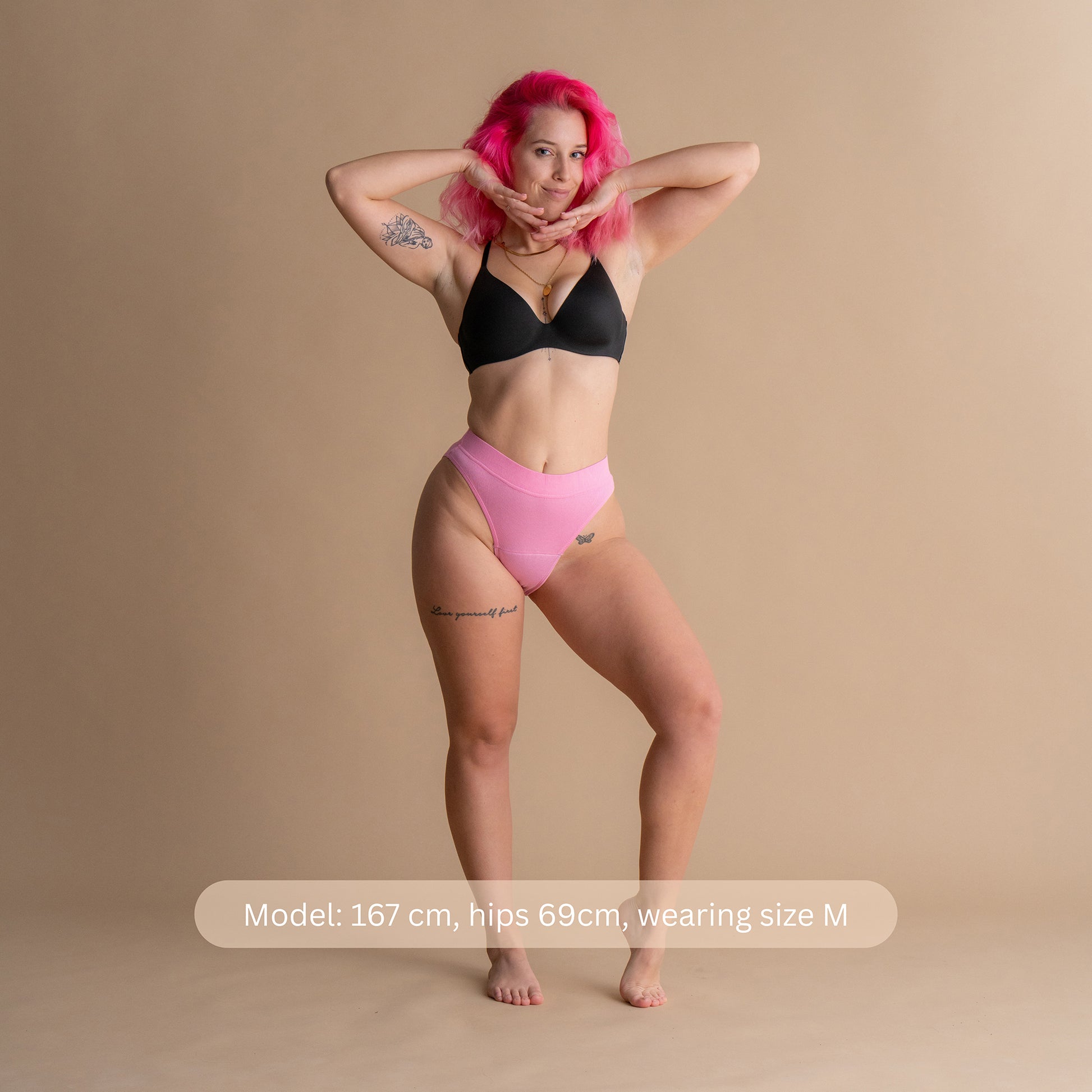 Model 167 cm, hips 69 cm, wearing size M – Leakproof Ribbed High Waist Brief pink