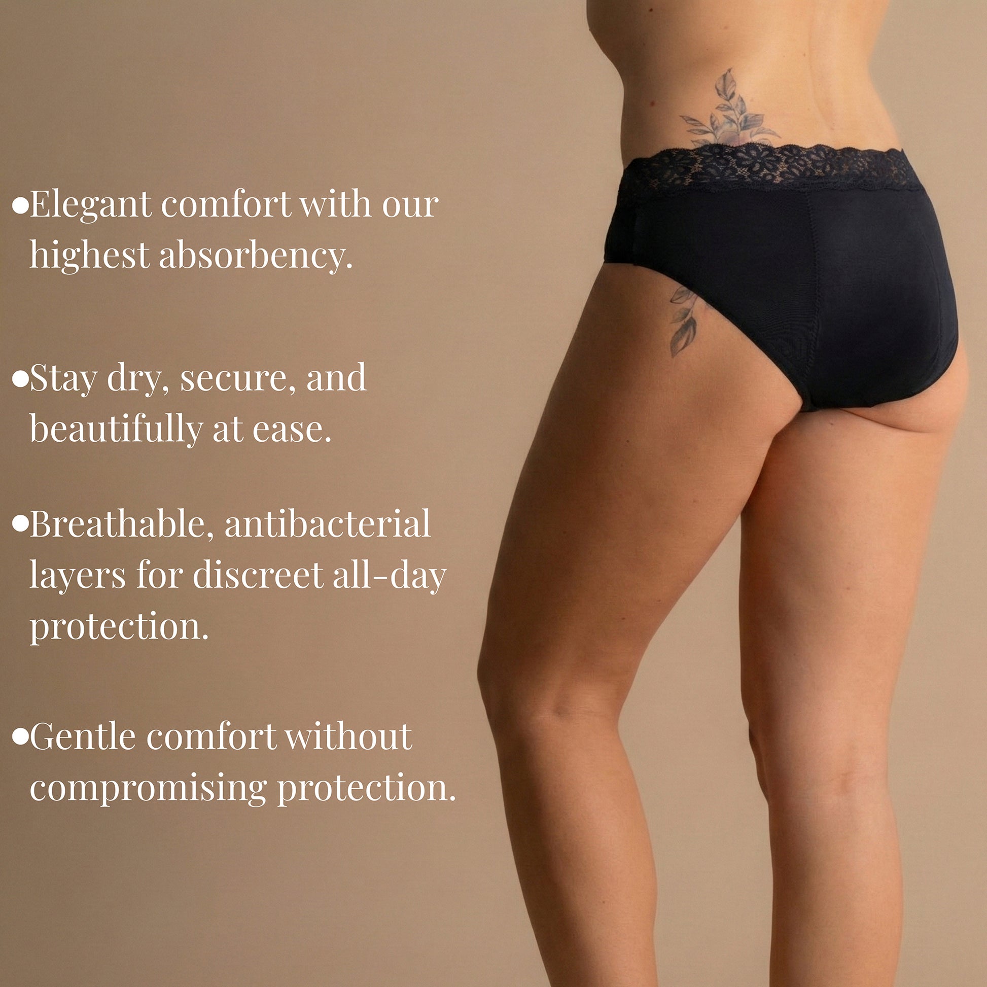 Back view of a model wearing Leakproof Soft Cotton Brief in black, with a lace waistband. The product offers elegant comfort with the highest absorbency, breathable, antibacterial layers for all-day protection, and gentle comfort without compromising protection.