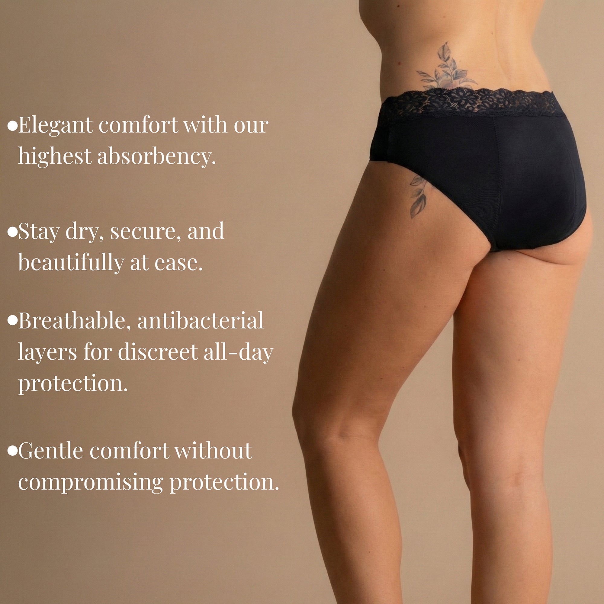 Back view of a model wearing Leakproof Soft Cotton Brief in black, with a lace waistband. The product offers elegant comfort with the highest absorbency, breathable, antibacterial layers for all-day protection, and gentle comfort without compromising protection.